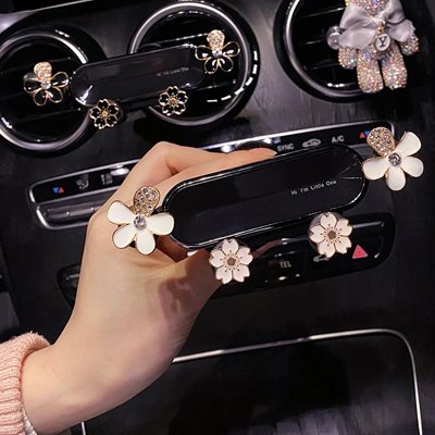 Support telephone voiture noir fleur blanche